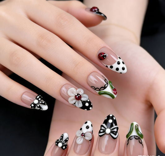 Close up of Ladybug Party 3D ladybug nail art press on nails