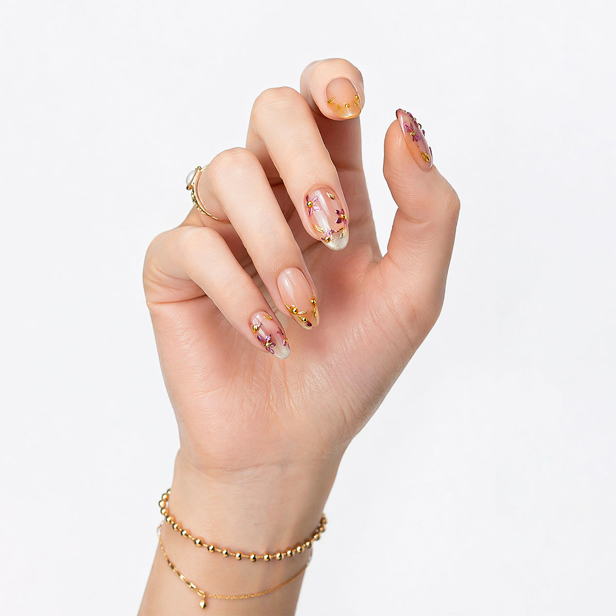 Woman wearing Blush Vine pink press on nails