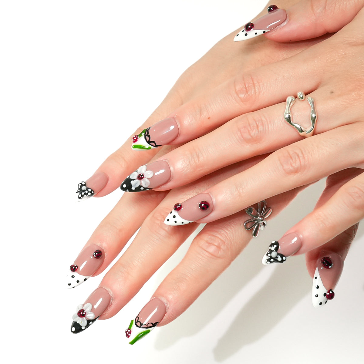 Close up of Ladybug Party 3D ladybug nail art press on nails