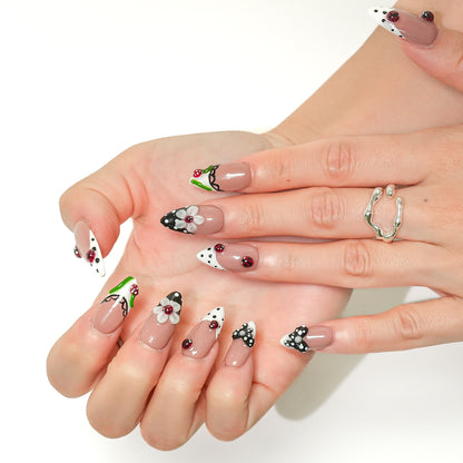 Close up of Ladybug Party 3D ladybug nail art press on nails