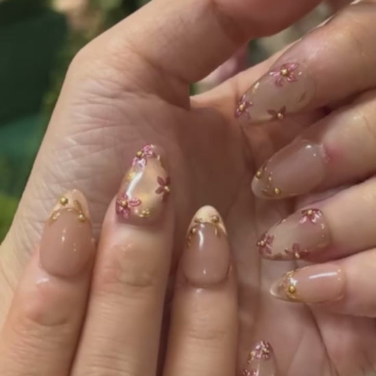 Blush Vine pink floral press on nails application and close-up showcase featuring handmade gel nail art by ROXORA.