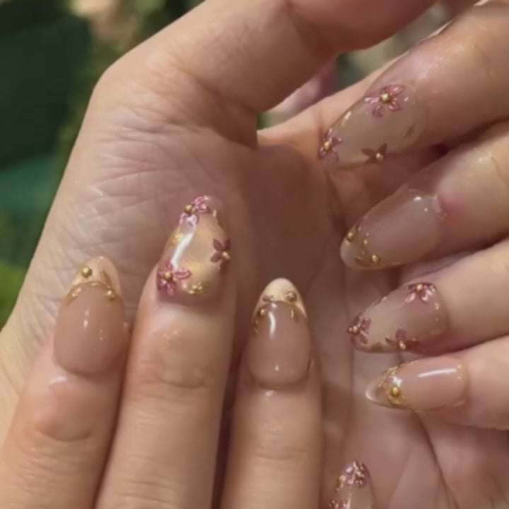 Blush Vine pink floral press on nails application and close-up showcase featuring handmade gel nail art by ROXORA.